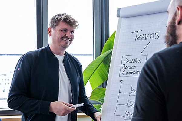 Personalised transition consultation with an advisor in front of a flip chart on Microsoft Teams telephony