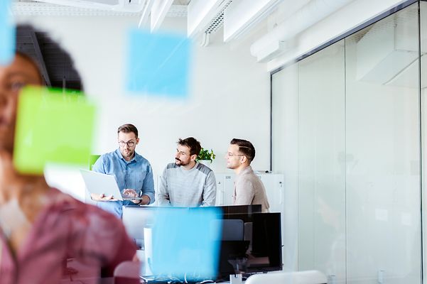A group of colleagues working together on a Zoom X whiteboard