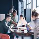 Diverse team working together in a modern co-working space