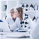 Two women work in a laboratory where 5G campus networks are used for data transmission.