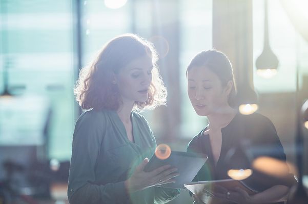 Businesswomen with digital tablets in the office