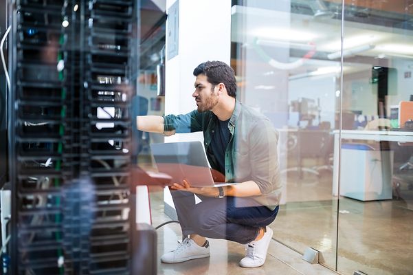 Technician replaces remote devices for Business Premium Access.