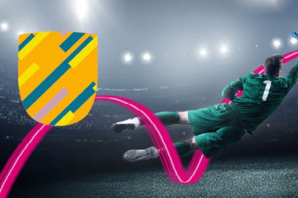 Goalkeeper catching a ball in a grey stadium with a magenta overlay and a protective shield overlay in yellow and green