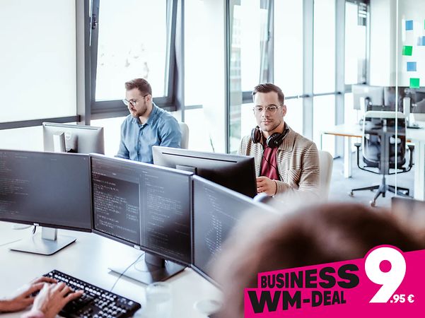 Signage: 'Business World Cup Deal' – just €9.95 for Telekom Business fibre broadband, featuring two men in an office